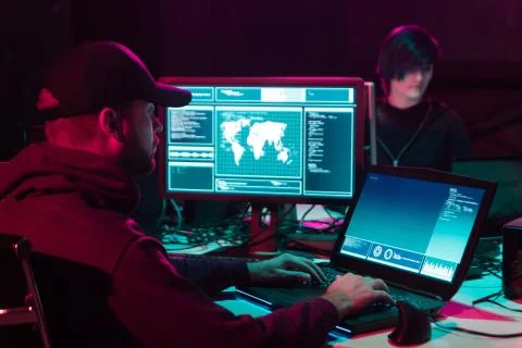Hackers making cryptocurrency fraud using virus software and computer interface Stock Photos