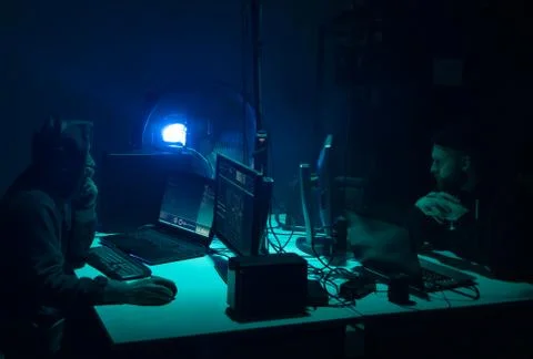 Hackers making cryptocurrency fraud using virus software and computer interface Stock Photos