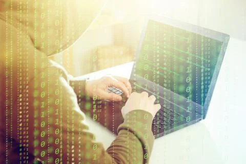 Hackers programmer look on screen and writes the program code hack information 스톡 사진