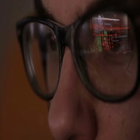 Hackers screen with binary code, data code reflectied in programmer's glasses Stock Footage 69405779