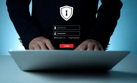 Hackers work on laptops in the dark. The concept of information security in.. Stock Photos