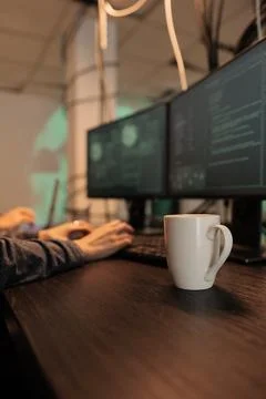 Hackers writing malware code, developers programming app on computer 库存照片