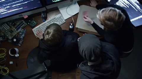 Hackers Writing Programming Code Stock Footage 76309224