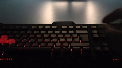 Hacking and Cyber Security male hands on modern keyboard typing. Video stock 83276683