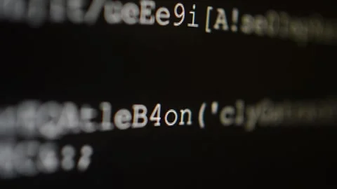 Hacking code program in close-up scrolling on the computer's monitor Stock Footage 199018891
