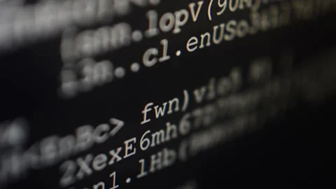 Hacking code program in close-up scrolling on the computer's monitor Stock Footage 199031528