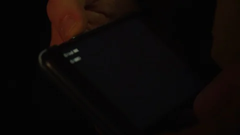 Hacking code on your phone Stock Footage 107324313