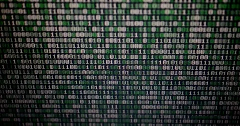 Hacking concept green text source code in monitor black tech security Stock Footage 334022055