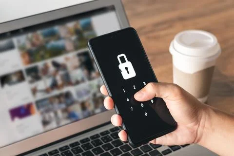 Hacking a Phishing mobile phone with a password to access a smartphone, sec.. Stock Photos