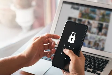 Hacking a Phishing mobile phone with a password to access a smartphone, sec.. Stock Photos