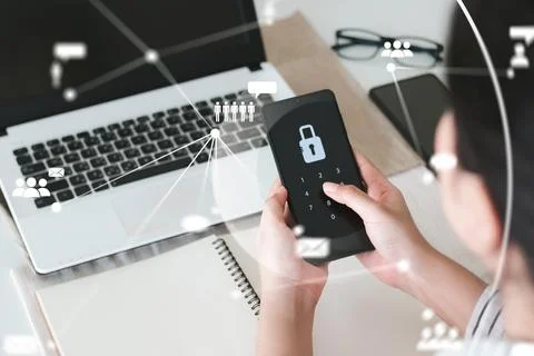 Hacking a Phishing mobile phone with a password to access a smartphone, secur Stock Photos
