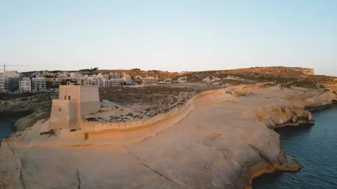 Had Dingli Cliffs salt pans. Aerial sunset cinematic drone view in Malta Stock Footage 270444717