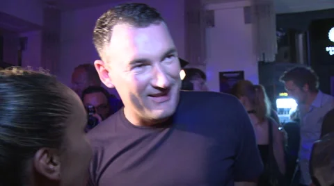 Hadnet and Michael Michalsky Interview at Fashion Week after party Stock Footage 60955030