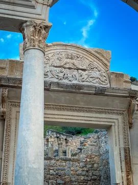 Hadrian Temple Arch Frames Ephesus Ruins Amid Marble Columns Фото