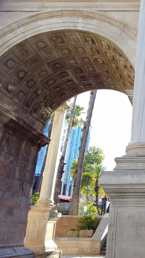 Hadrian’s Gate in Antalya, close-up of marble columns and ornate carvings Video stock 317742656
