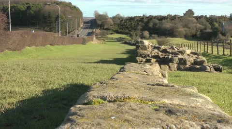 Hadrian's Wall in bright winter sunlight, Roman Military Frontier Stock Footage 1089348