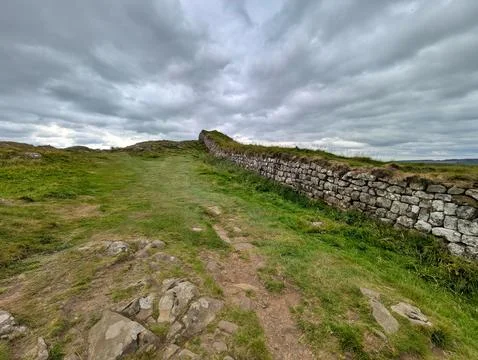 Hadrian's wall under a dramatic sky Stock Photos