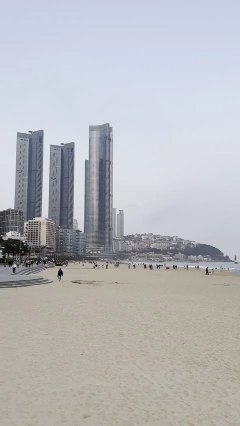 Haeundae Beach and LCT The Sharp at Dusk in Busan Stock Footage 306762456