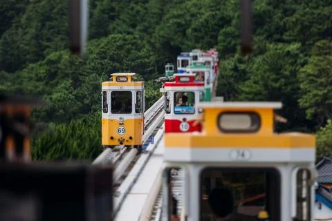 Haeundae Blue Line Park, Busan, ride on multicoloured sky capsule train, ra.. Fotos de archivo