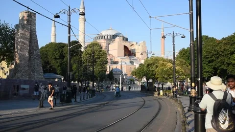 Hagia Sofia Instambul, Turkey. Tram and pedestrians passing by. Video stock 202310665