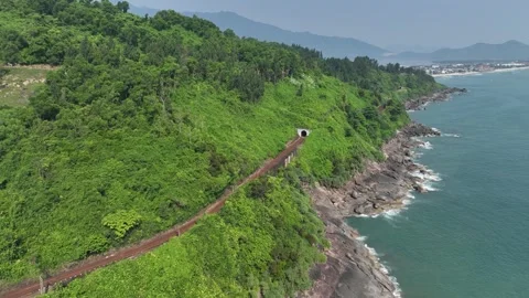 Hai Van Pass in Quang Nam province, Vietnam, is a winding mountain road Stock Footage 242775792