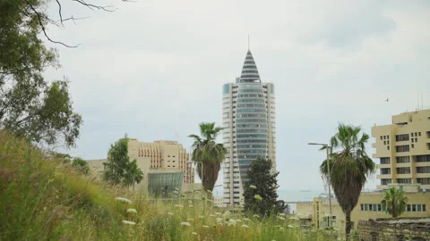 Haifa city scape iconic office building dolly track Stock Footage 343630841