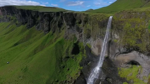 Haifoss jet waterfall drops on rocks under a rock. Andreev. Stock Footage 78535485