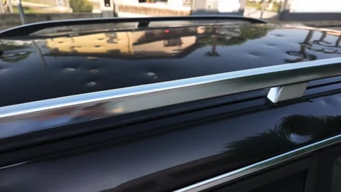 Hail damage to car bodywork Stock Footage 311542547