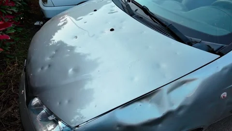 Hail damage to car bodywork Stock Footage 325518583