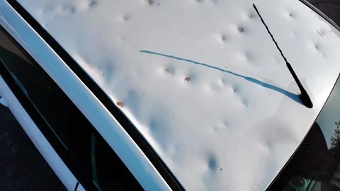 Hail damage to car bodywork Stock Footage 325519104