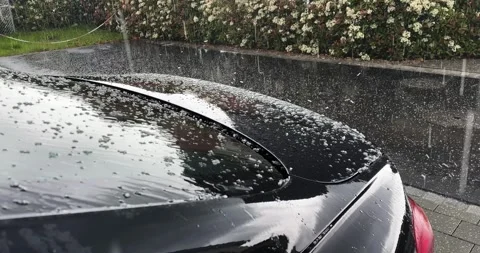 Hail Damage on Car During Heavy Storm Weather Close Up Stock Footage 336613024