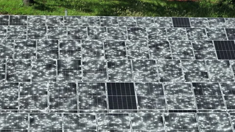 Hail Damaged Solar Panels with Lateral Parallax Aerial 4K50 動画素材 331777065