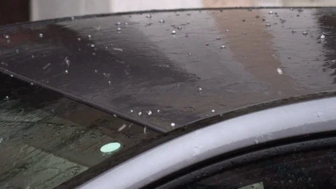 Hail fall on the car, small hail. Bad weather conditions Stock Footage