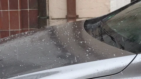 Hail fall on the car, small hail. Bad weather conditions Stock Footage 94218530