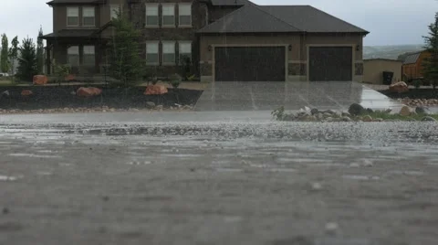 Hail falling on a driveway Stock Footage 52099772