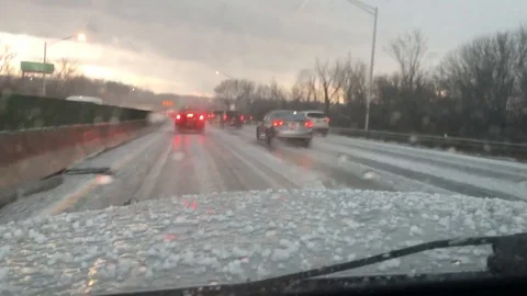 Hail Falling on Highway Traffic with audio Stock Footage 101104807