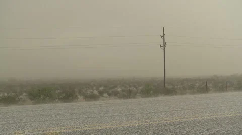 Hail falling on road Stock Footage 1106181