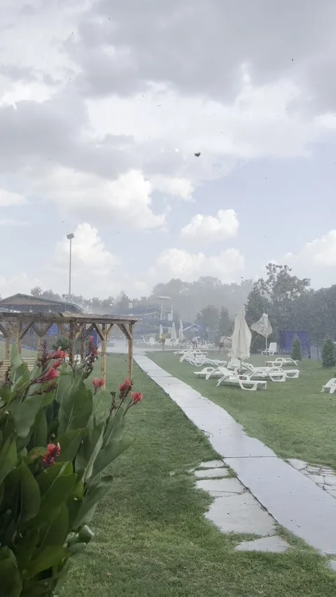 Hail, rain and storm in an open area for recreation Stock Footage 237760671