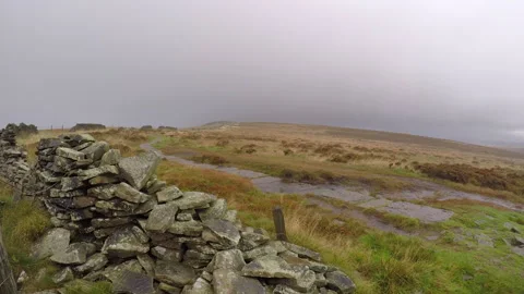 Hail storm hiking down from Shining Tor Stock Footage 162663765
