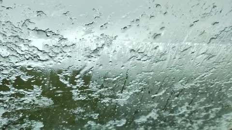 Hail storme on the car window Stock Footage 244656747