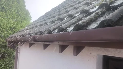 Hailstones on a rooftop Stock Footage 326456510