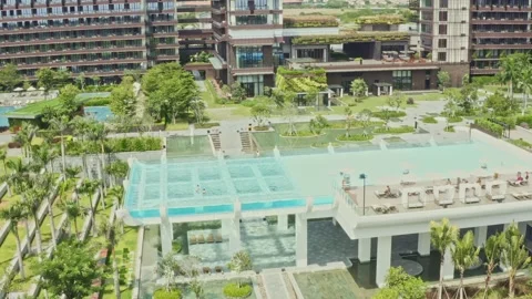 Hainan Haitan Bay elevated pool architecture day Stock Footage 161296970
