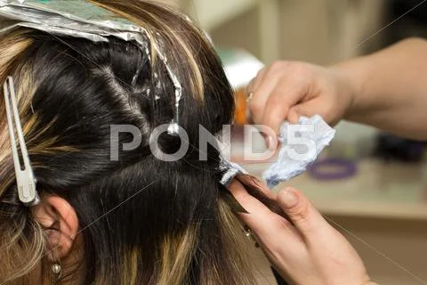 Hair colouring in process Stock Photos