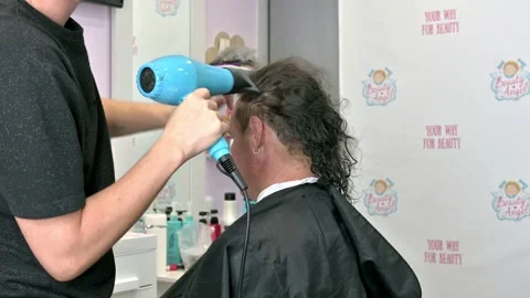 hair dryer men in beauty salon Stock Video Pond5
