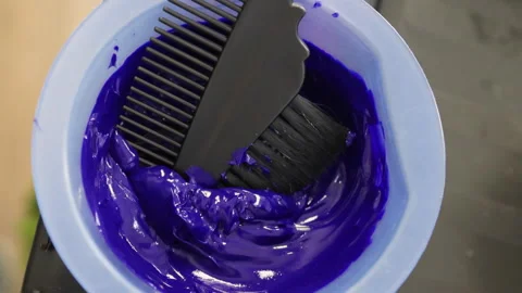 Hair dye in a plastic container. Stock Footage 277800429