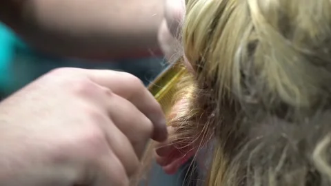 Hair extensions removing Video stock 149297856