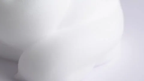 Hair foam mousse or soap suds, macro. Beauty background. Close up of white .. Stock Footage 262527853