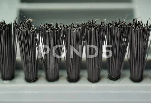 Hair of Hand held small vacuum brush cleaner as texture background Stock Photos