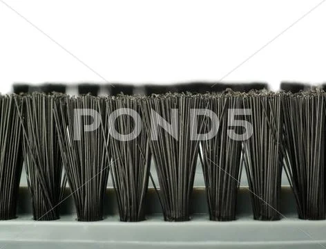 Hair of Hand held small vacuum brush cleaner isolated over the white background Stock Photos
