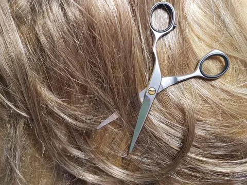 Hair scissors background, cut, split ends, hand Foto stock
